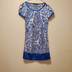 White and blue Vero Moda dress. The dress is made 96% polyester and 4% lycra